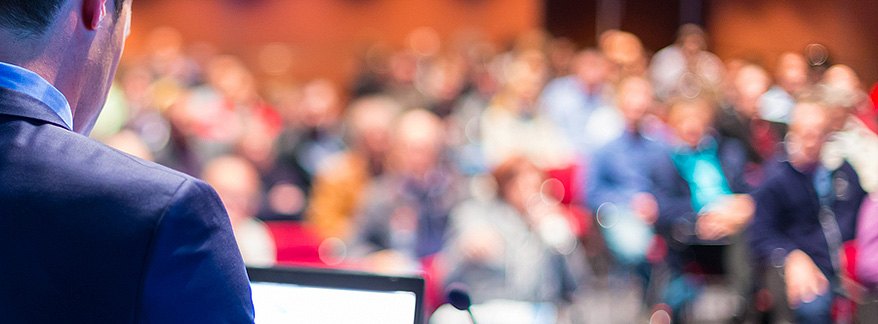 Man speaking on content leadership event